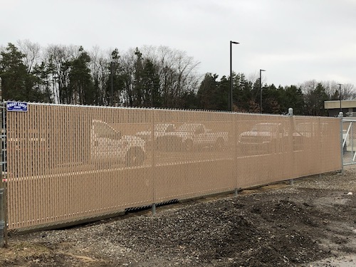 Commercial Chain Link Fence with Bottom Locking Beige Slats
