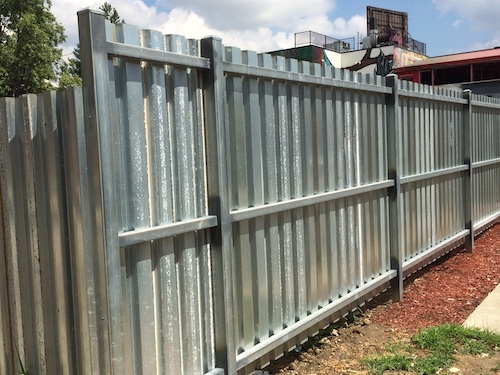 Commercial Corrugated Steel Fence For Additional Security And Privacy 1