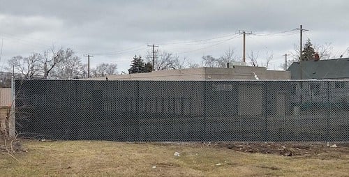 Galvanized Commercial Chain Link Fence with Black Privacy Slats