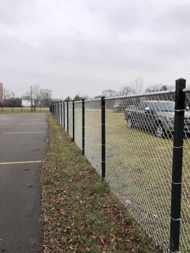 Steel Square Black Posts Retrofitted With Galvanized Chain LInk Fabric